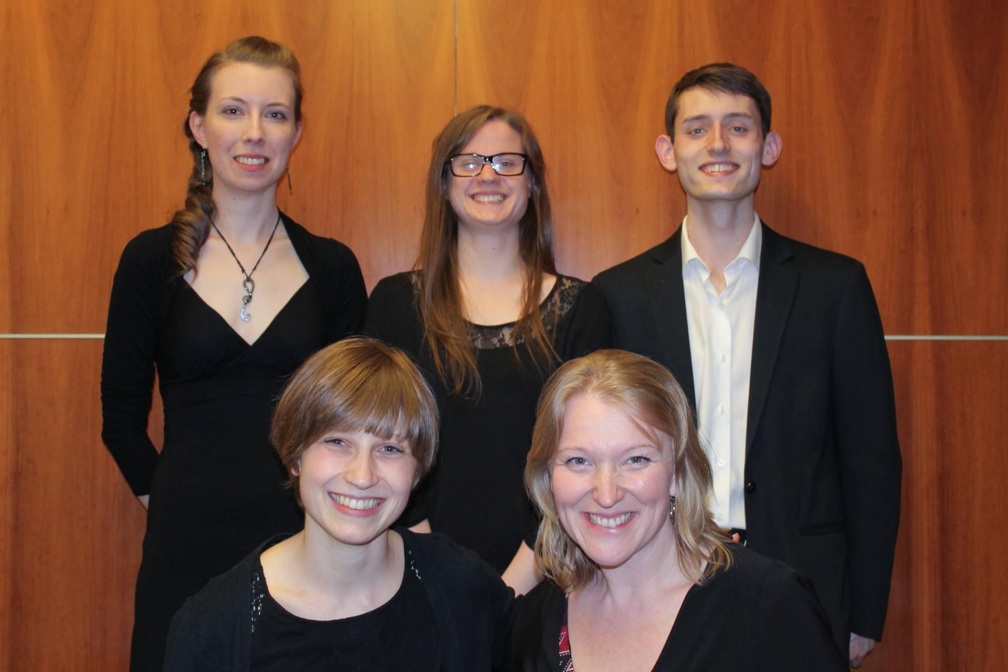 GVSU oboists standing with Dr. Vavrikova after a performance